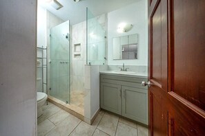 Shower, towels, toilet paper