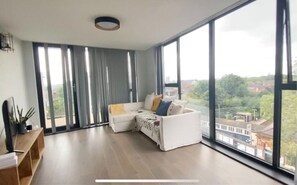 Apartment, Mehrere Betten | Wohnzimmer