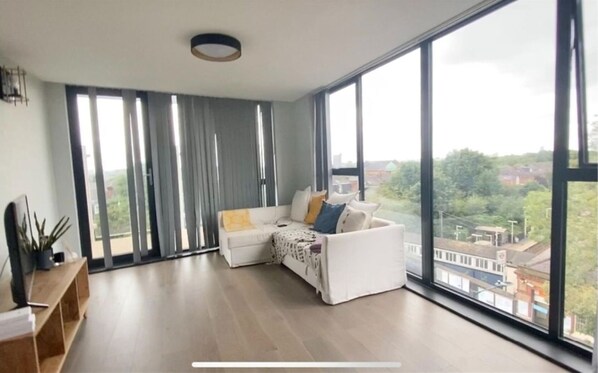Apartamento, várias camas | Sala de estar