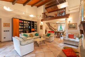 Family Villa, Multiple Bedrooms, Refrigerator & Microwave, Mountainside (Villa Le Poggiola) | Living area | 21-inch TV with satellite channels, fireplace, DVD player - Villa Le Poggiola (Borgo San Lorenzo)