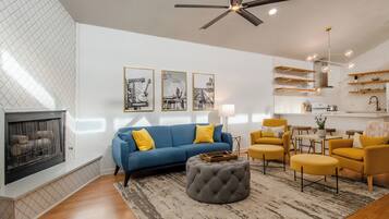 House, Multiple Beds, Balcony | Living area | 40-inch TV with cable channels, fireplace, streaming services