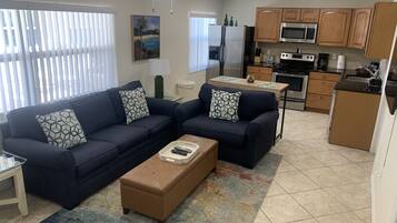Apartment, Multiple Beds, Patio | Living room | 40-inch TV with cable channels