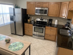 Apartment, Multiple Beds, Patio | Private kitchen