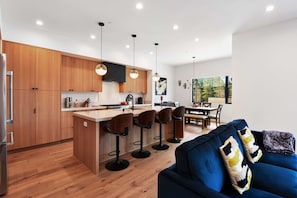 Townhome, Multiple Beds, Hot Tub, Mountain View (Paradise at The Palisades) | Living area | 65-inch flat-screen TV with digital channels, fireplace - Enjoy Paradise Hot Tub, Bike & Beach Equipment! (Olympic Valley)