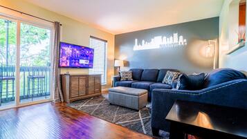 Condo, 1 King Bed with Sofa bed, Balcony | Living room | 40-inch TV with cable channels