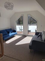 Quarto família, suíte, vista para o jardim | Lounge