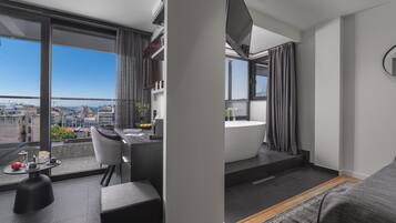 Suite Premium | Minibar, escritorio, sistema de insonorización y ropa de cama