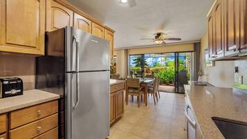 Condo, Multiple Beds, Patio, Garden View (Keauhou Punahele #E105) | Private kitchen | Fridge, microwave, stovetop, dishwasher