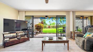 Condo, Multiple Beds, Patio, Garden View (Keauhou Punahele #E105) | Living area | 49-inch flat-screen TV with digital channels