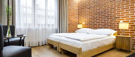 Quarto casal superior | Escrivaninha, Wi-Fi de cortesia, roupa de cama