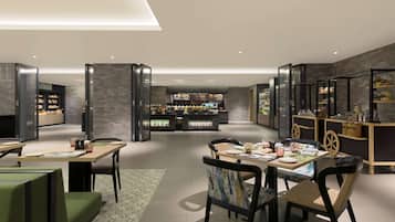 A modern restaurant with a central dining area, a bar, and a kitchen visible in the background.