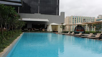 Outdoor pool, open 6:00 AM to 8:00 PM, pool loungers