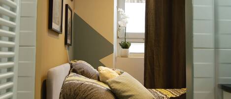 1 bedroom, travel crib, WiFi, bed sheets