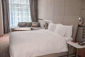 Ropa de cama de alta calidad, minibar, caja fuerte y escritorio