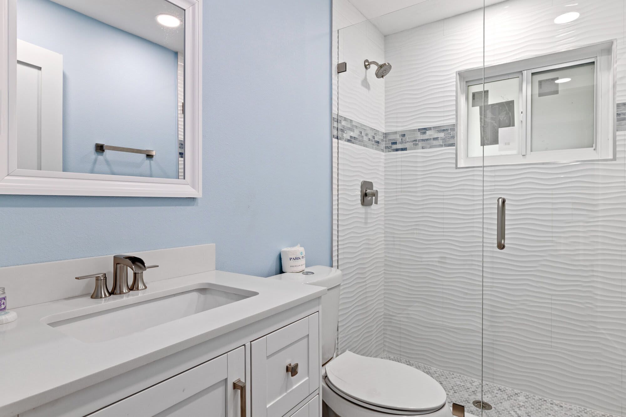 Bathtub, hair dryer, towels