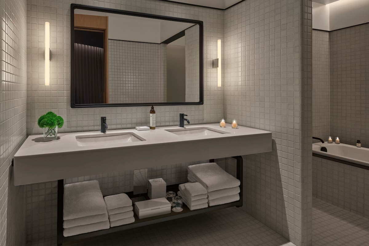 suite, 1 bedroom, harbour view, corner | bathroom | rainfall showerhead, eco-friendly toiletries, hair dryer, bathrobes