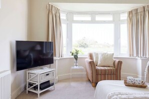 4 bedrooms, iron/ironing board, travel cot, WiFi
