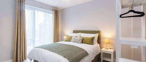 4 bedrooms, desk, iron/ironing board, travel cot