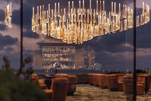 3 bars/lounges, poolside bar, beach bar