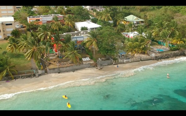 On the beach, sun loungers, beach towels