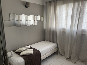 3 dormitorios, tabla de planchar con plancha, wifi gratis y ropa de cama