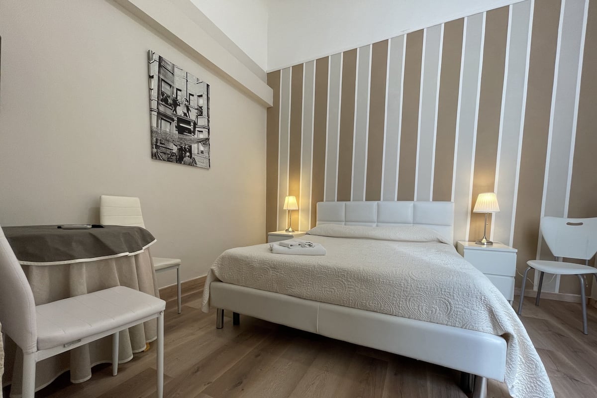 Luxe beddengoed, pillowtop-bedden, een bureau, gratis wifi