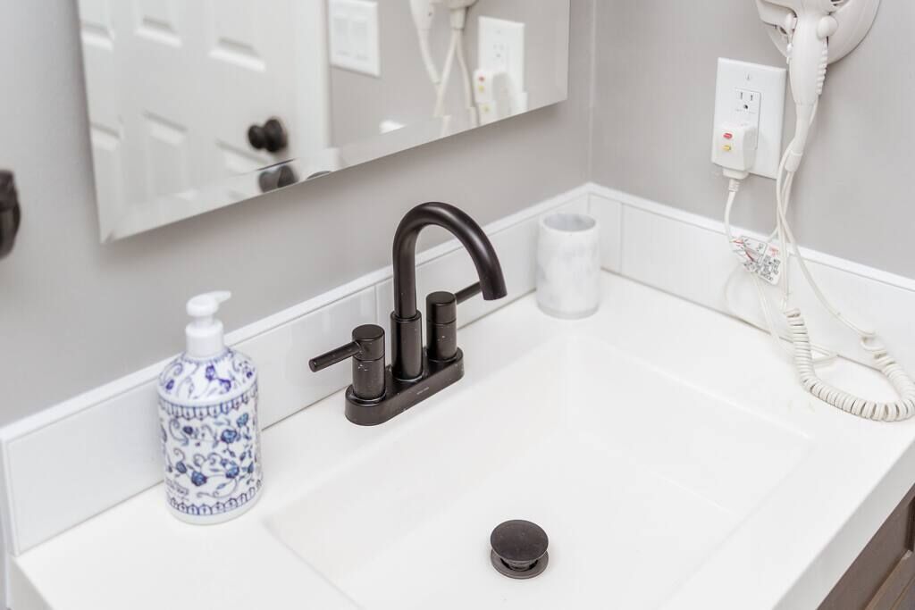 Hair dryer, towels, soap, shampoo