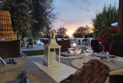 Agriturismo i Giardini di Margius near the sea with swimming pool surrounded by greenery