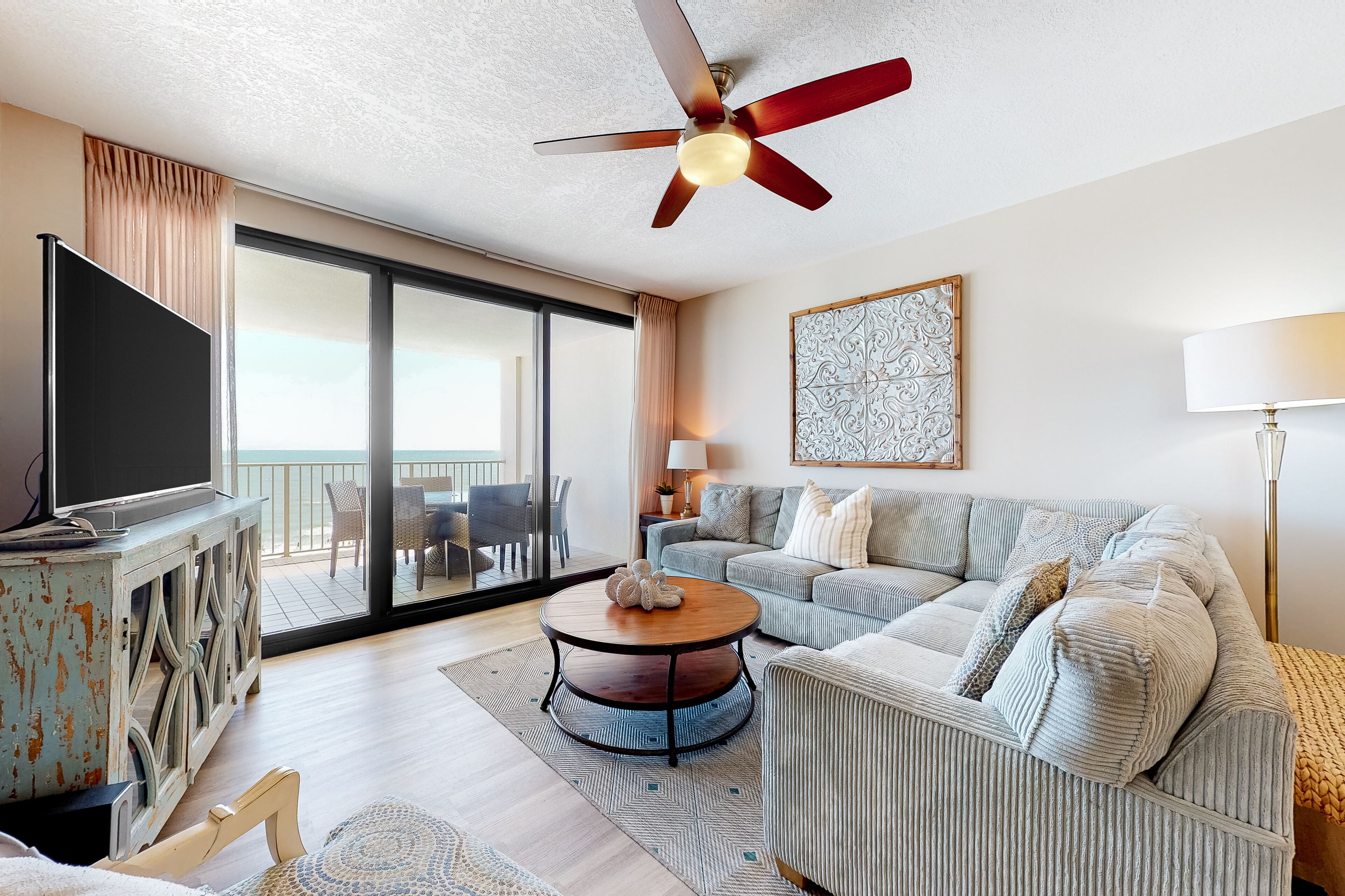 Gulf-front condo with shaded deck, AC, pools, hot tub, tennis & Gym
