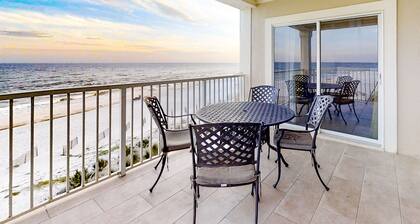 Gulf-Front condo with balcony, beach access, WiFi, AC, & outdoor pool