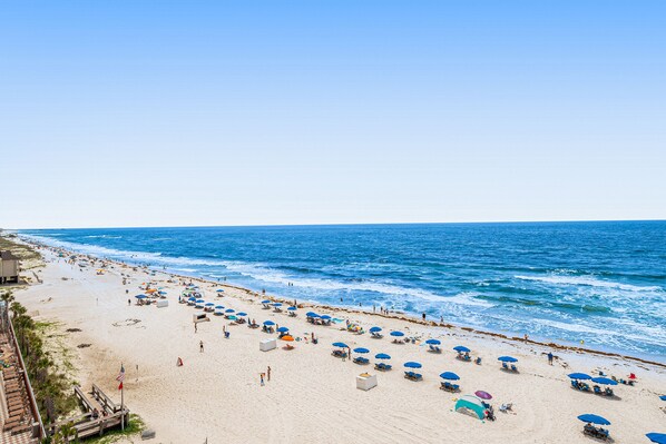 Enjoy ocean views from the comfort of your room, with access to the beach and a variety of seating options along the promenade.