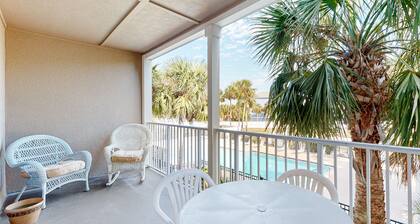 Sunny condo with pool, hot tub, pool views, balcony, & AC