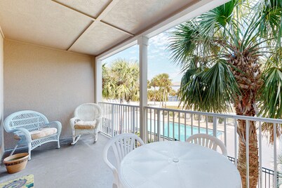 Sunny condo with pool, hot tub, pool views, balcony, & AC
