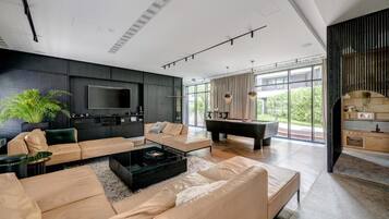 Comfort Apartment | Living room | 55-inch LED TV with cable channels, TV