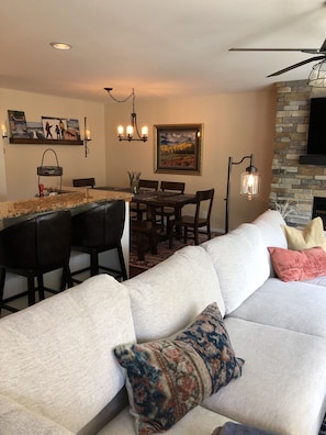 Smart TV, fireplace, books, printers