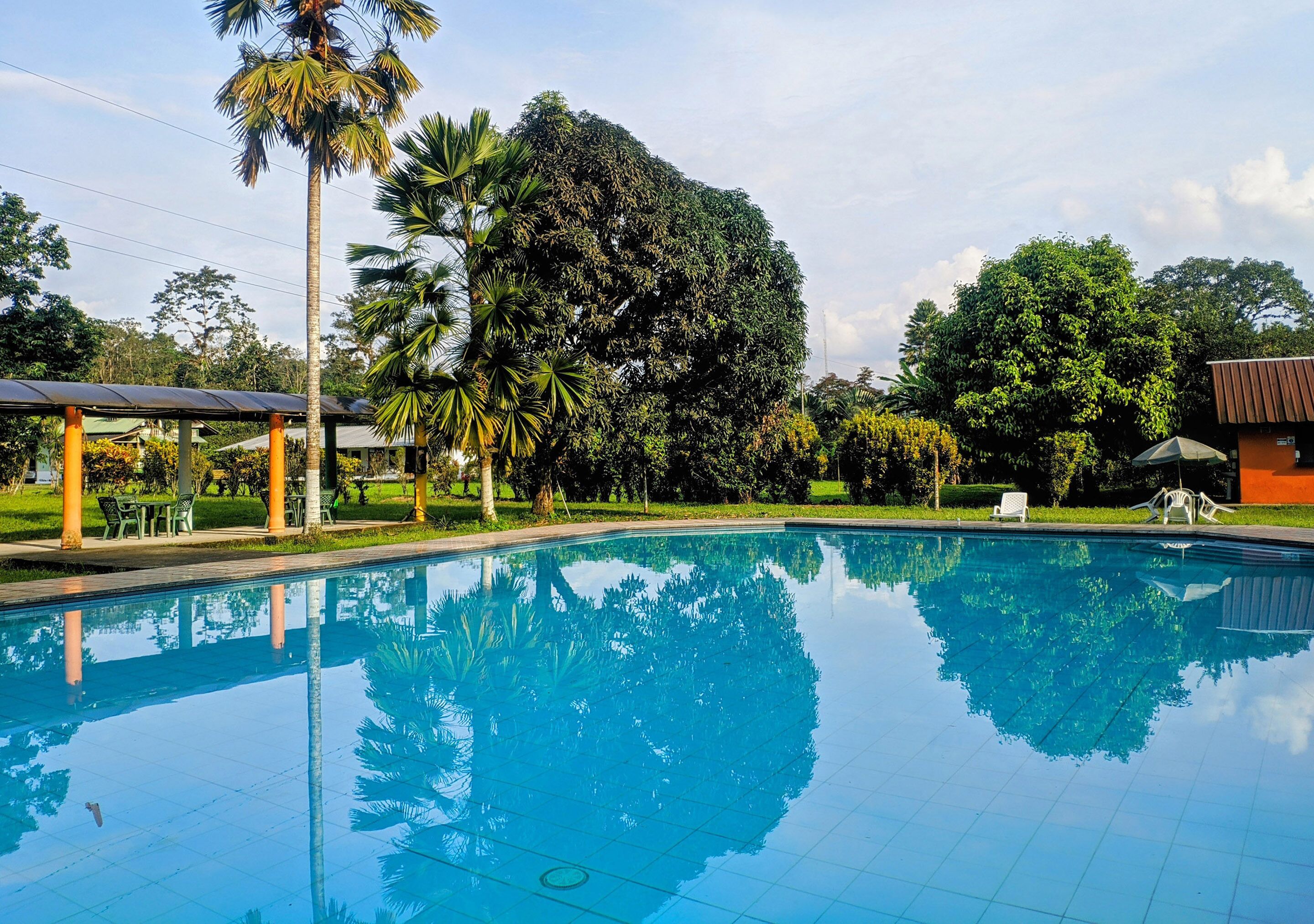 2 outdoor pools, open 6:00 AM to 10:00 PM, pool umbrellas, sun loungers