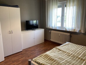 3 dormitorios, tabla de planchar con plancha, wifi gratis y ropa de cama