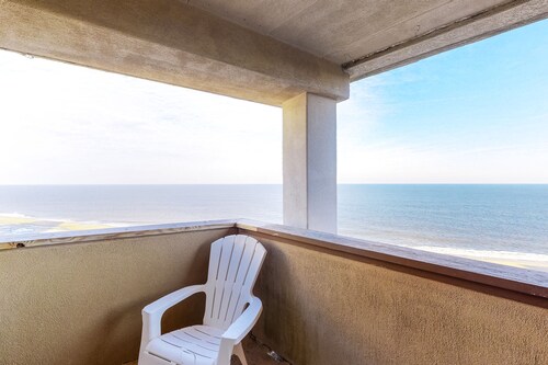 Two-story penthouse condo with spacious balcony, pool, & incredible views