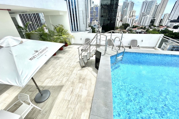 Outdoor pool, open 9:00 AM to 7:00 PM, pool loungers
