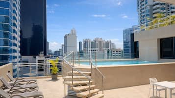 Outdoor pool, open 9:00 AM to 7:00 PM, sun loungers