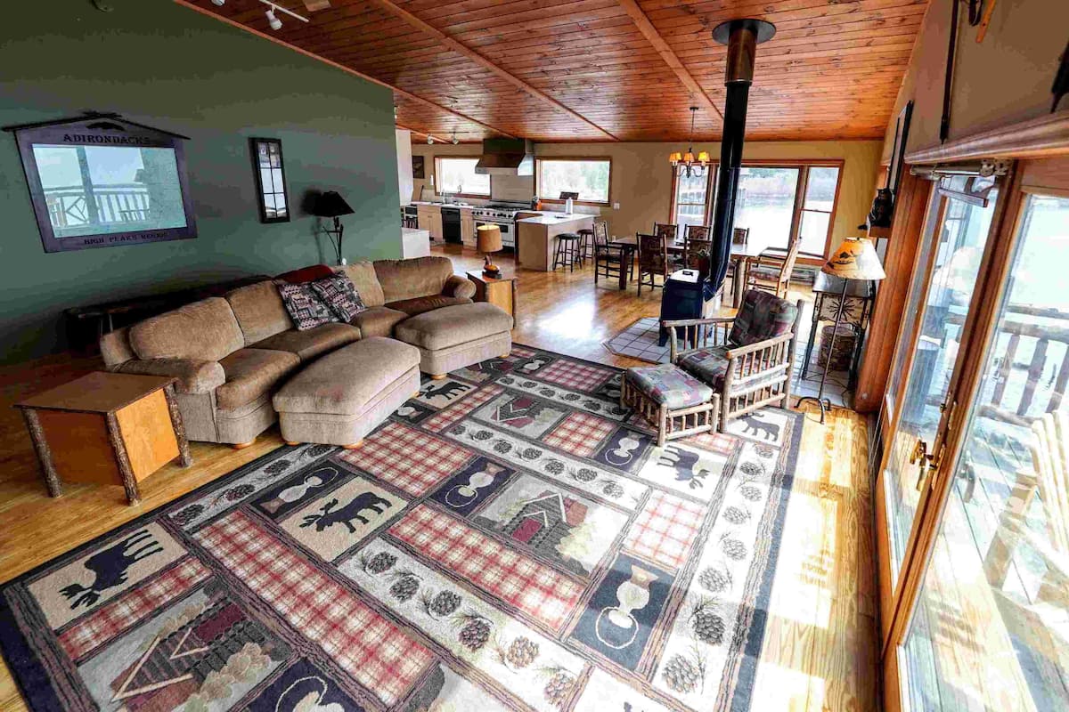 Panoramic Suite, Mountain View, Lakeside | Living area | TV