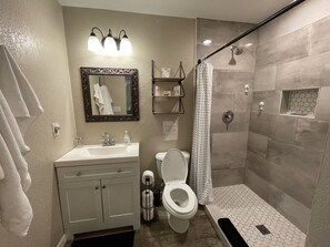 Shower, hair dryer, towels, soap