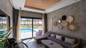 Executive Pool Jacuzzi Suite | Free minibar items, in-room safe, individually decorated