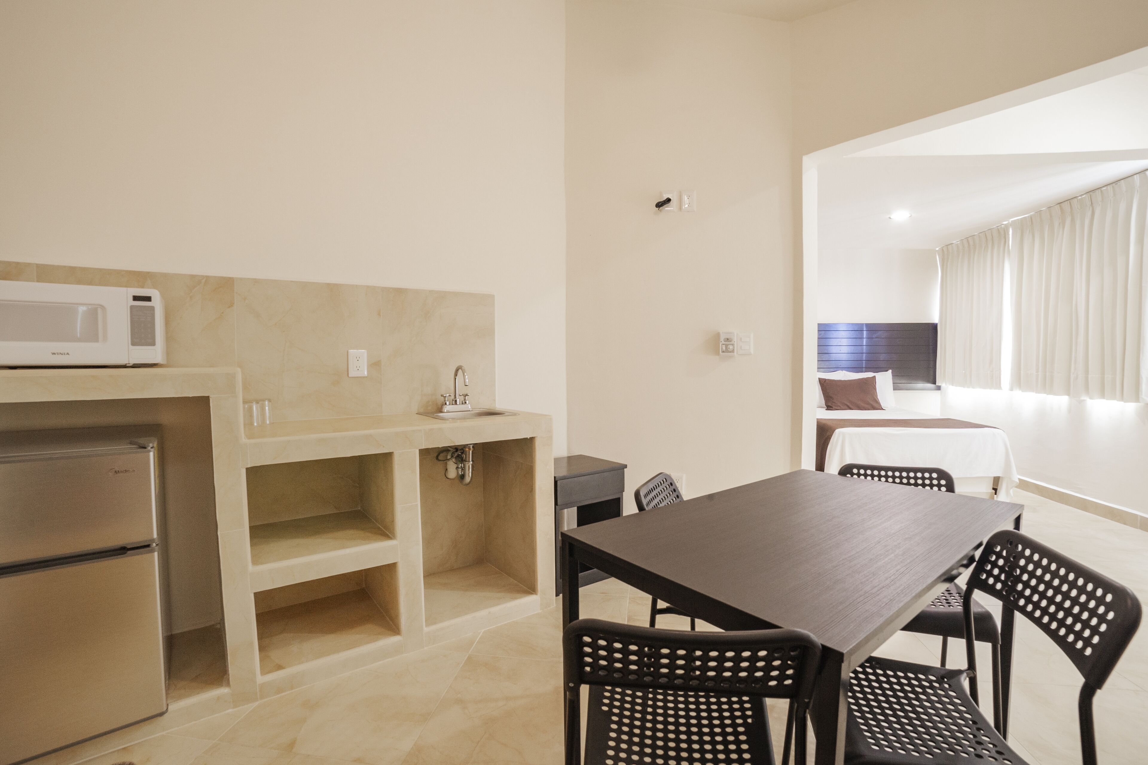 double room, 2 double beds | private kitchen | mini-fridge, microwave, dishwasher, dining tables