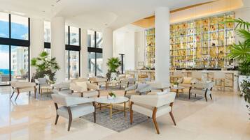 5 bars/lounges, poolside bar, beach bar