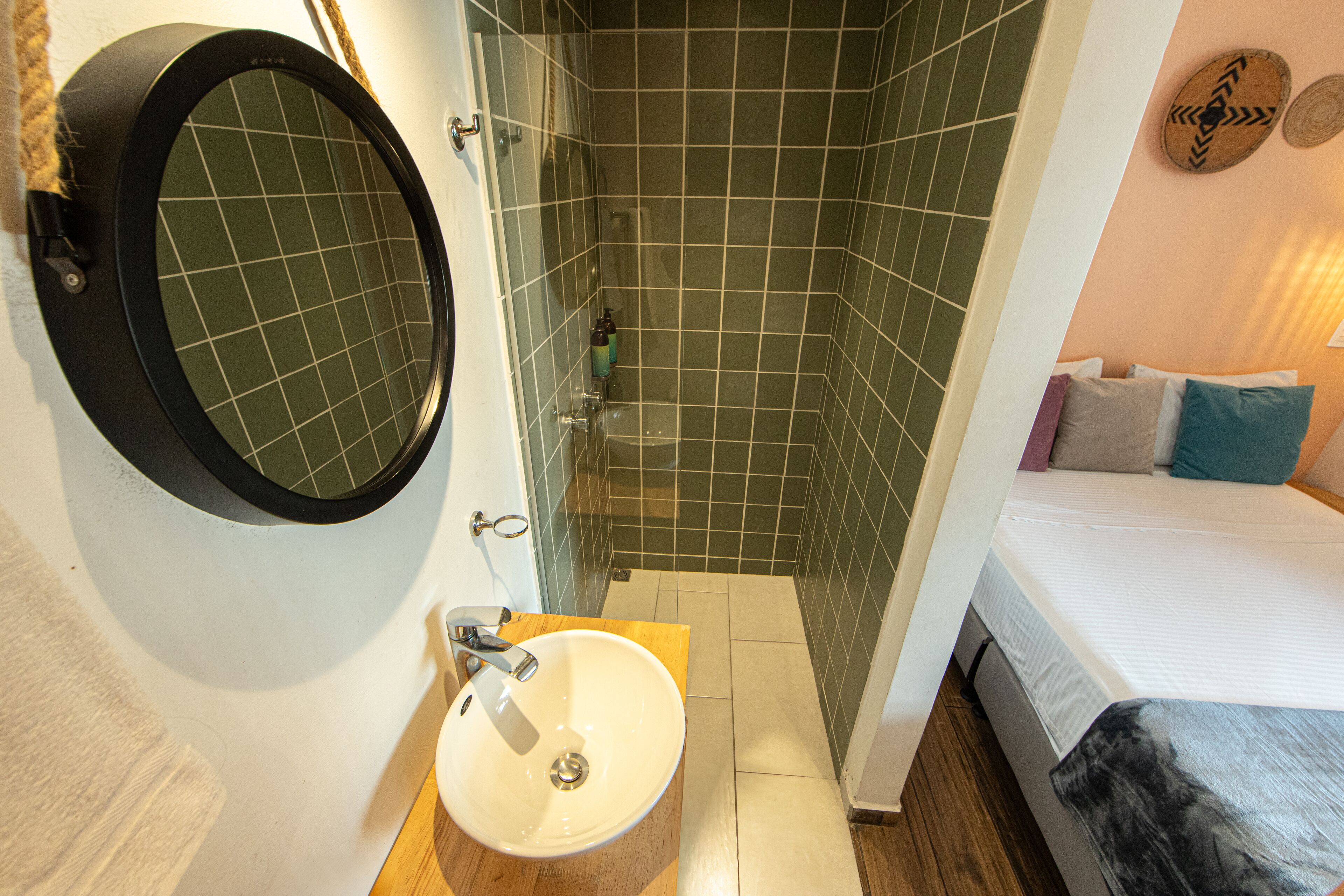 standard double room | bathroom | shower, hair dryer, towels, soap