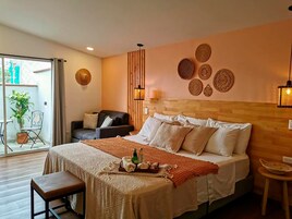 Premium bedding, desk, laptop workspace, blackout curtains
