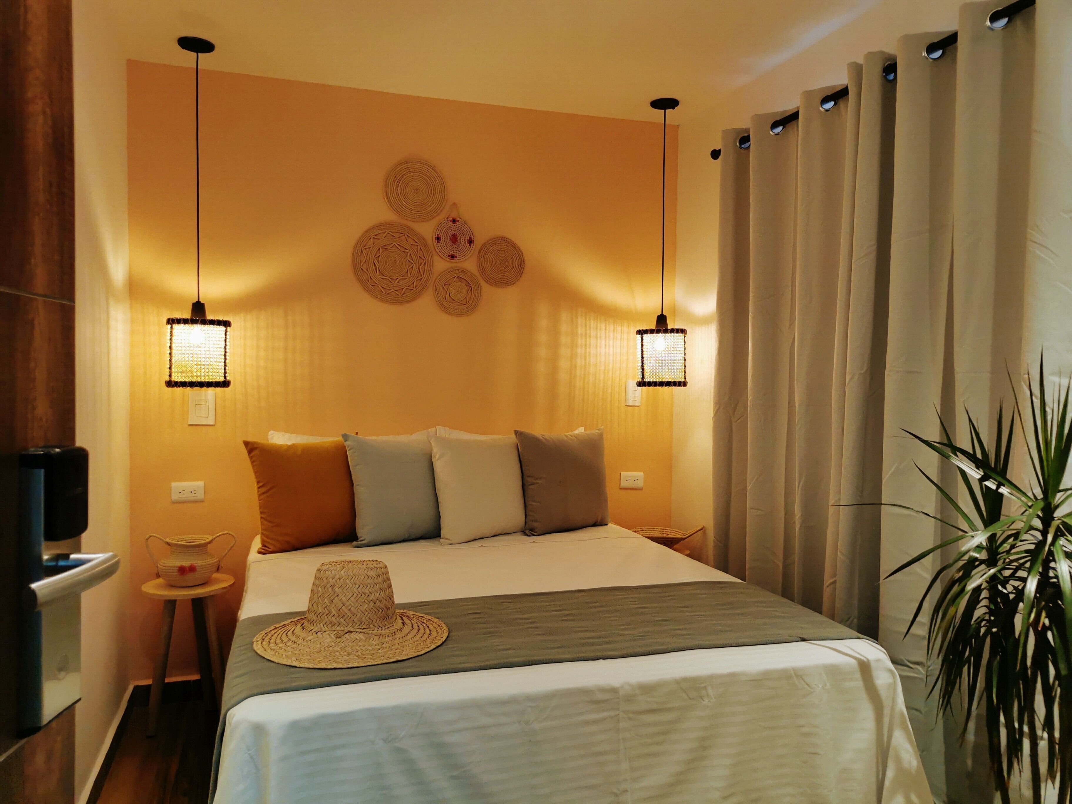 Premium bedding, desk, laptop workspace, blackout curtains