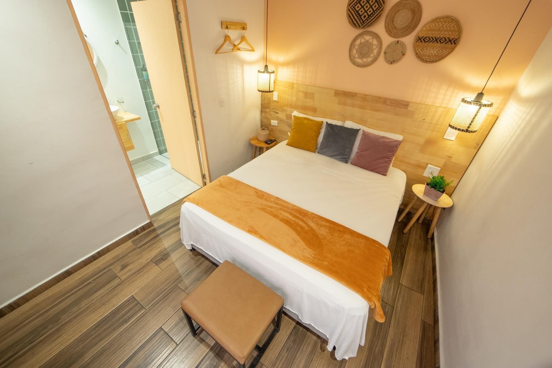 Premium bedding, desk, laptop workspace, blackout drapes