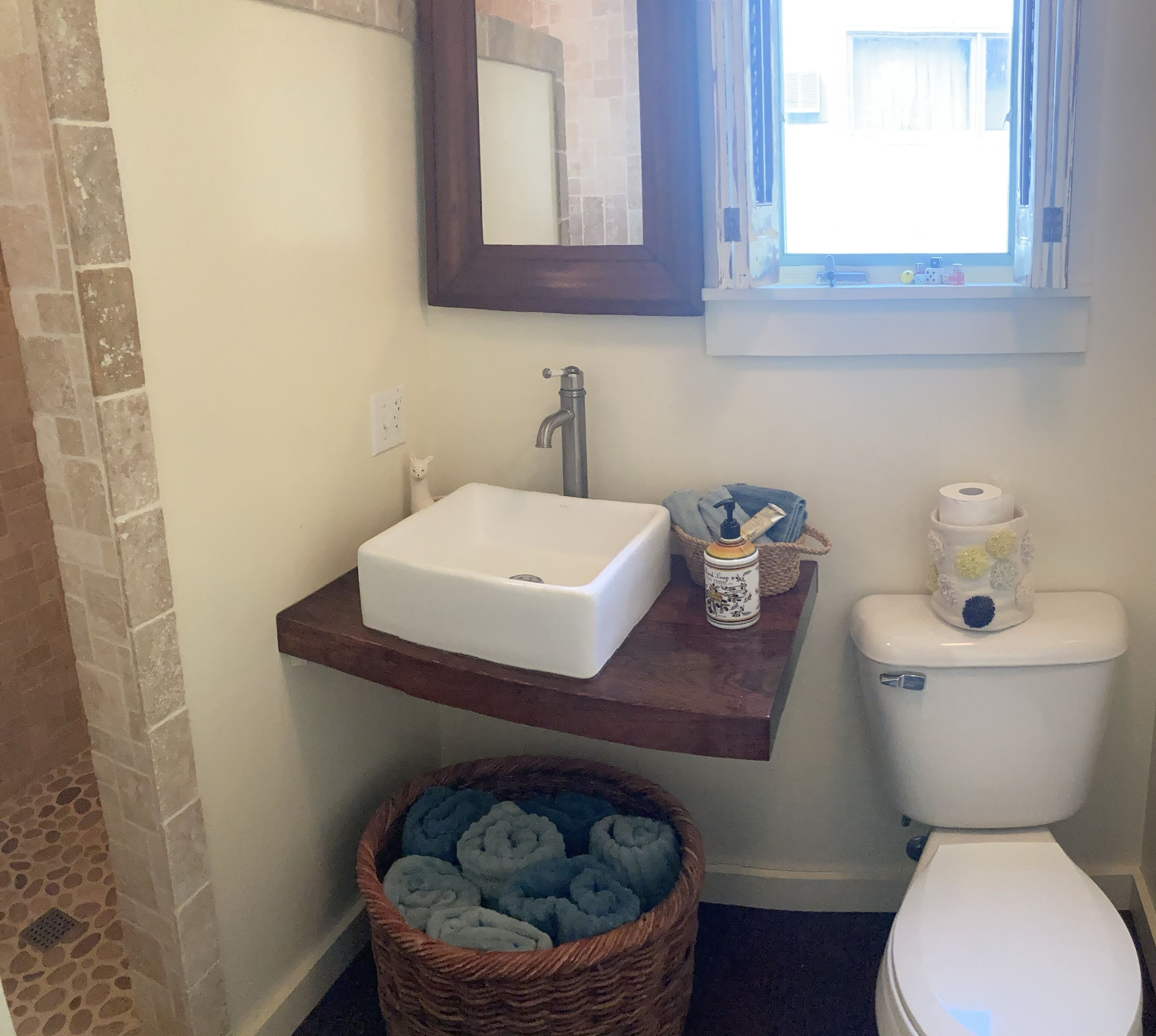 Shower, towels, soap, toilet paper